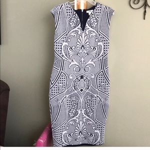 Navy blue and white sheath dress.